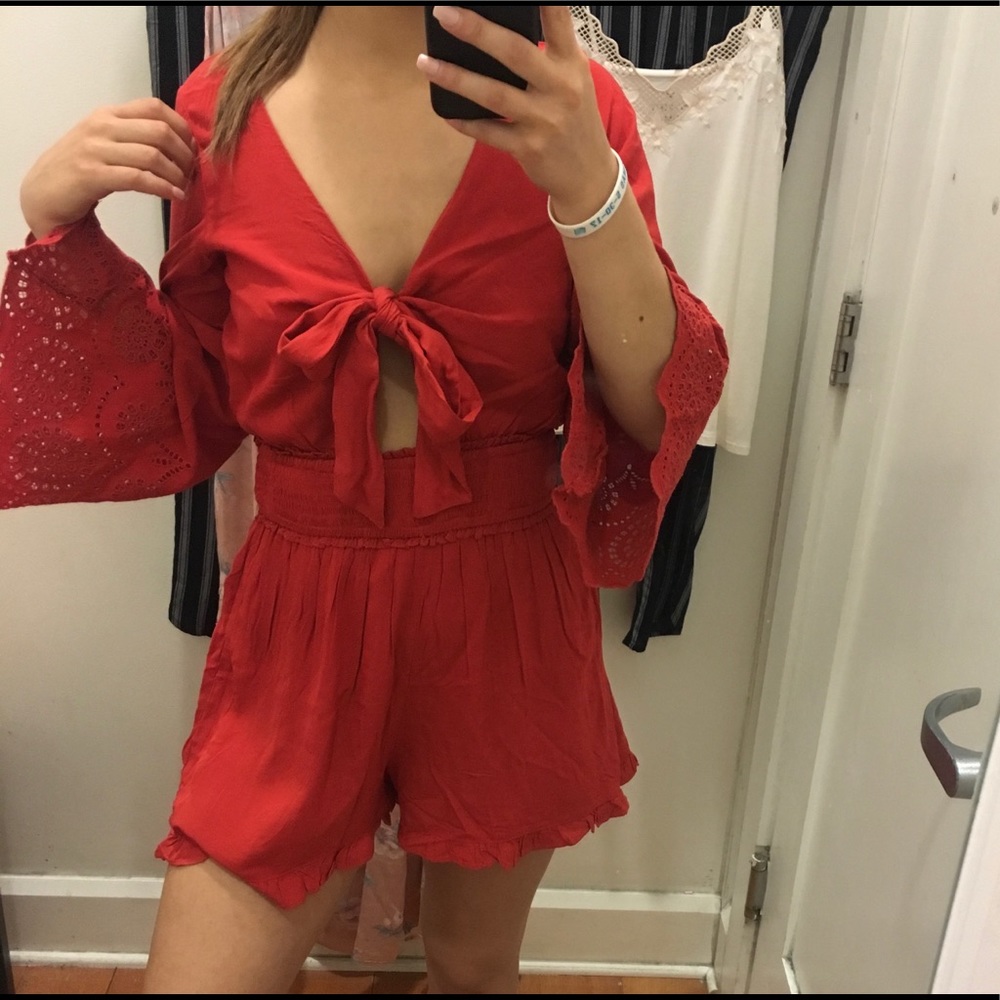 Red romper.